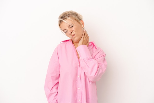 Young Russian woman isolated on white background having a neck pain due to stress, massaging and touching it with hand.