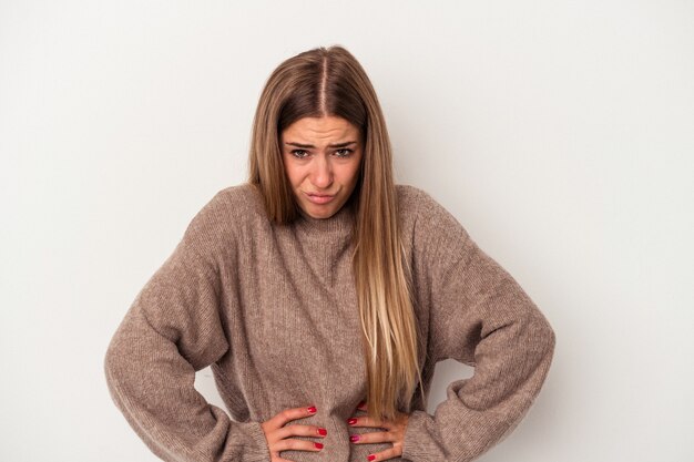 Young Russian woman isolated on white background showing a dislike gesture, thumbs down. Disagreement concept.