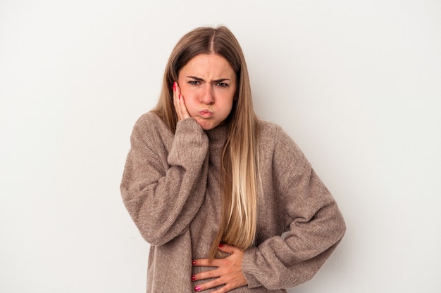 Young Russian woman isolated on white background unhappy looking in camera with sarcastic expression.