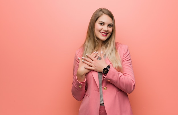 Young russian woman wearing pajama doing a romantic gesture