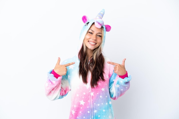 Young Russian woman wearing a unicorn pajama isolated on white background proud and selfsatisfied