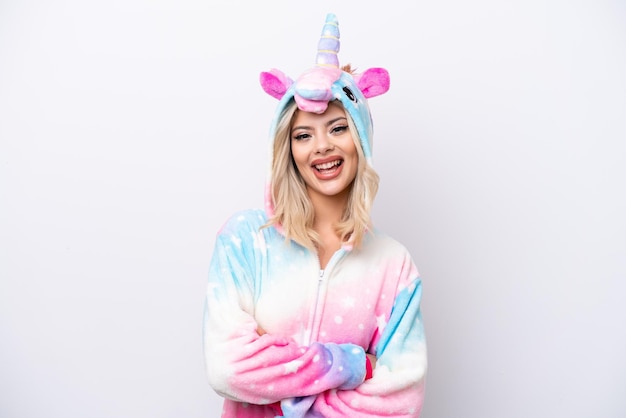 Young Russian woman with unicorn pajamas isolated on white background happy and smiling