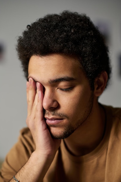 Young sad man having depression