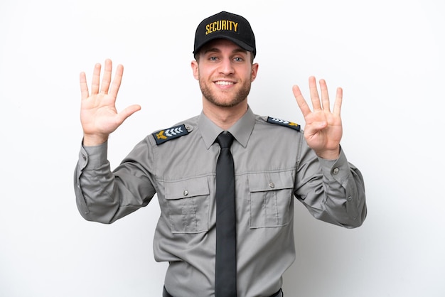 Young safeguard caucasian man isolated on white background counting nine with fingers