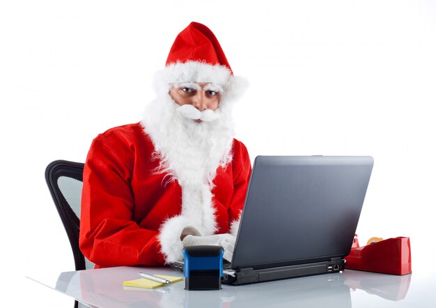 Young Santa Claus with notebook