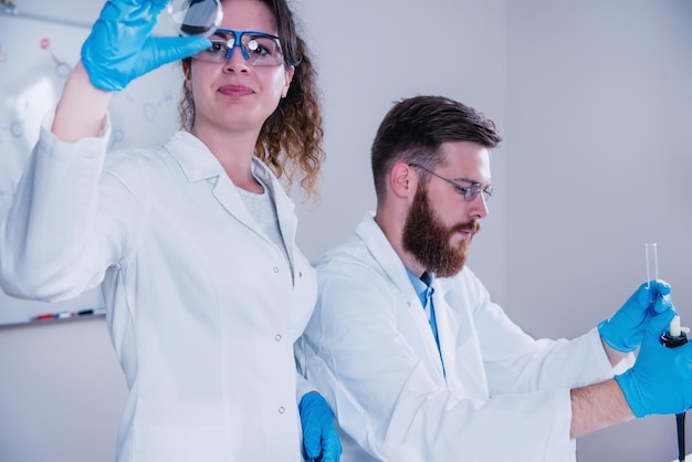 Young Scientist Doing Experiments In The Laboratory