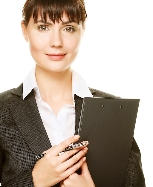 Young secretary taking notes