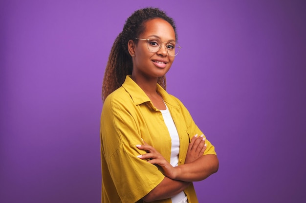 Young selfconfident african american woman arms crossed looking at camera