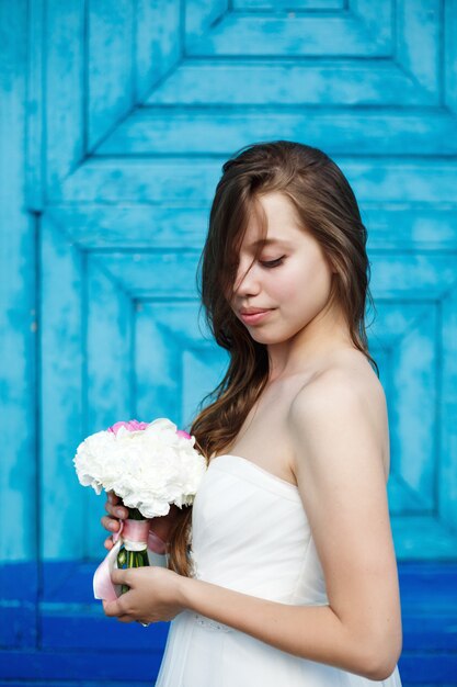 Young sensual bride in wedding dress