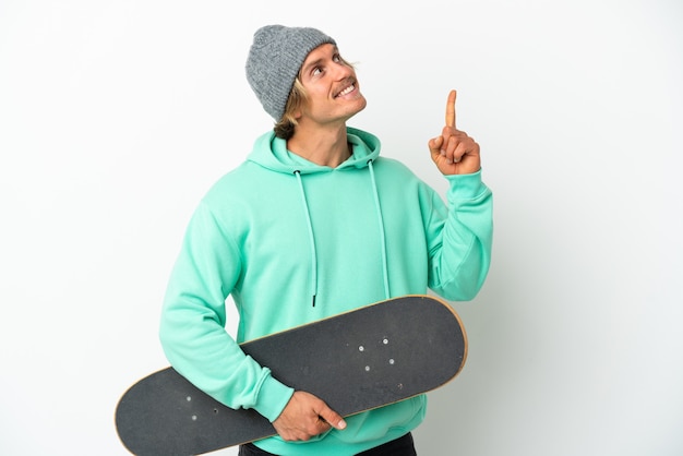 Young skater blonde man isolated