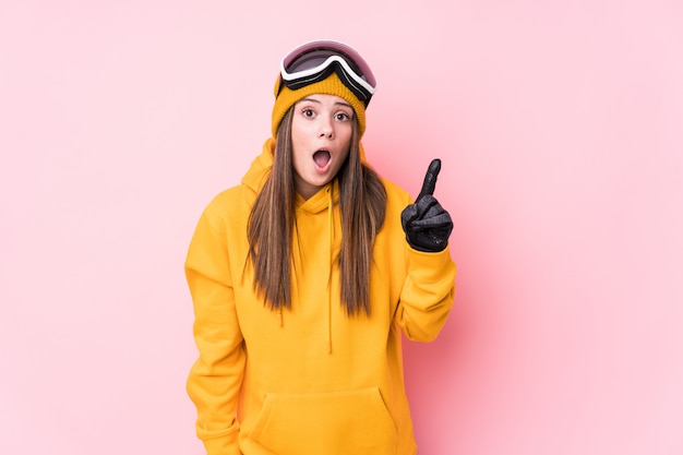 Young skier woman having an idea