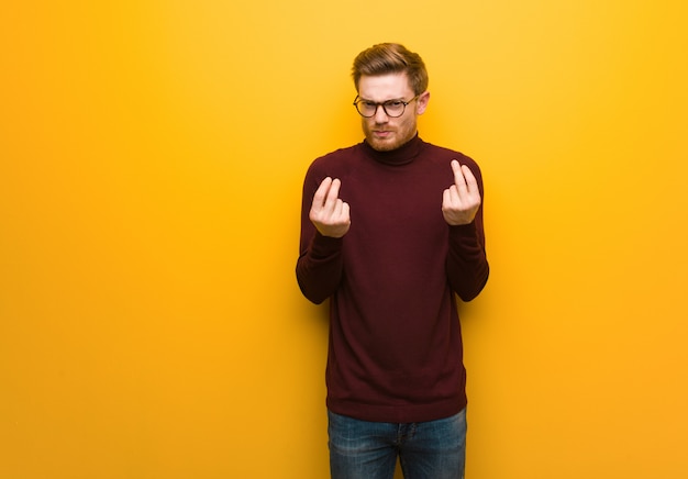 Young smart man doing a gesture of need