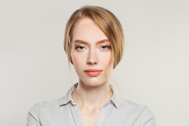 Young smart woman on white background portrait