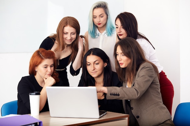 Young smiling business women working new project at office.