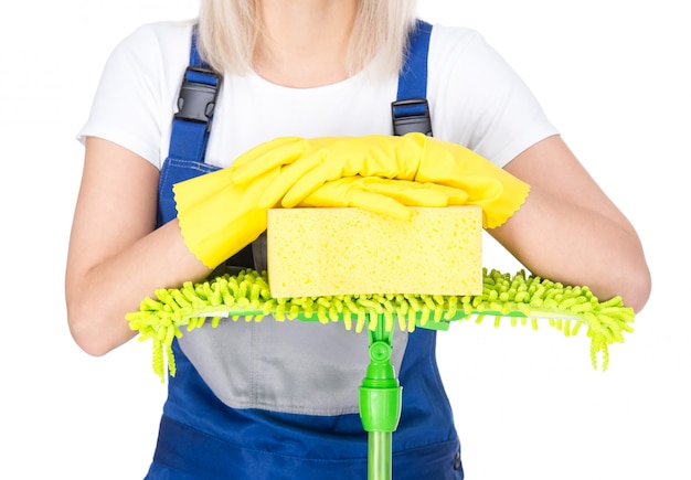 Young smiling cleaner woman with cleaning broom.