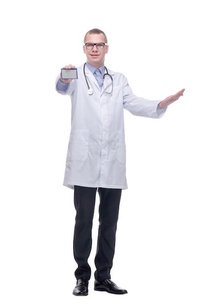 Young smiling doctor holding business blank card