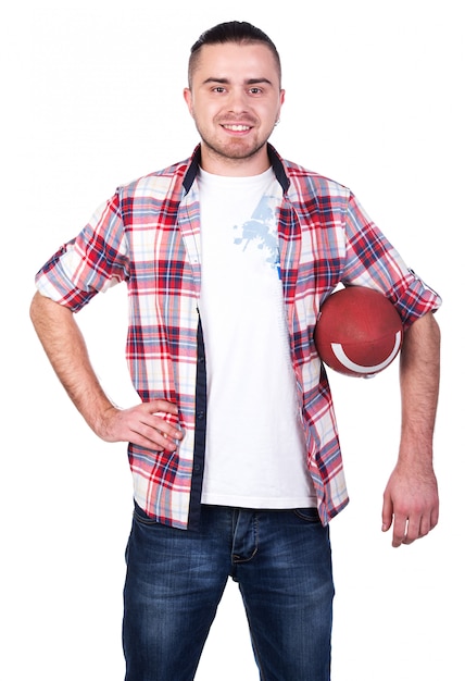 Young smiling man with football isolated 