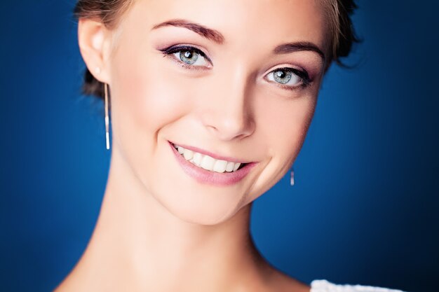 Young Smiling Woman. Cute Face Closeup