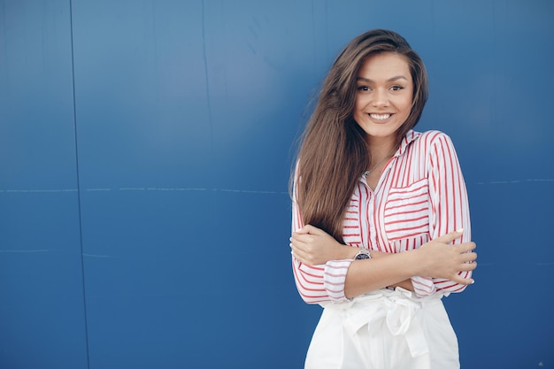 Young smiling woman outdoors