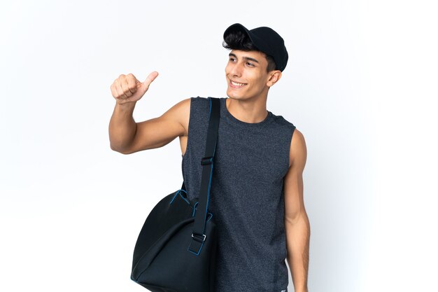 Young sport Argentinian man with sport giving a thumbs up gesture