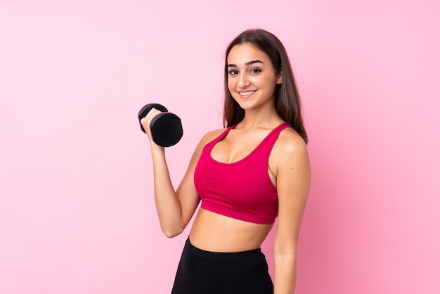 Young sport girl making weightlifting