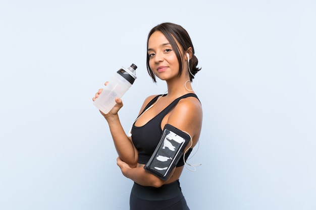 Young sport girl with a bottle of water