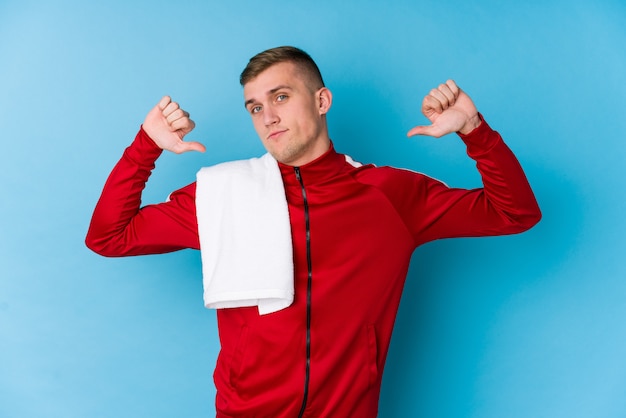 Young sport man feels proud and self confident, example to follow.