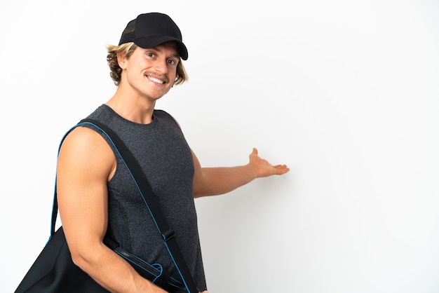 Photo young sport man with sport bag isolated