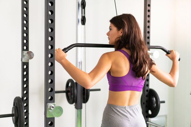 Young sport woman in a gym