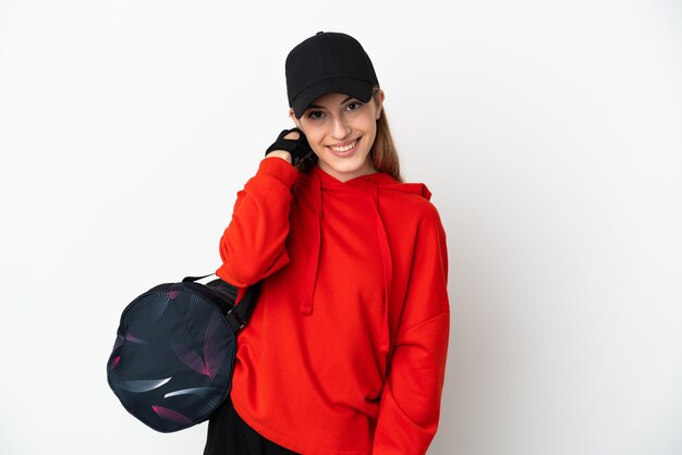 Young sport woman with sport bag isolated