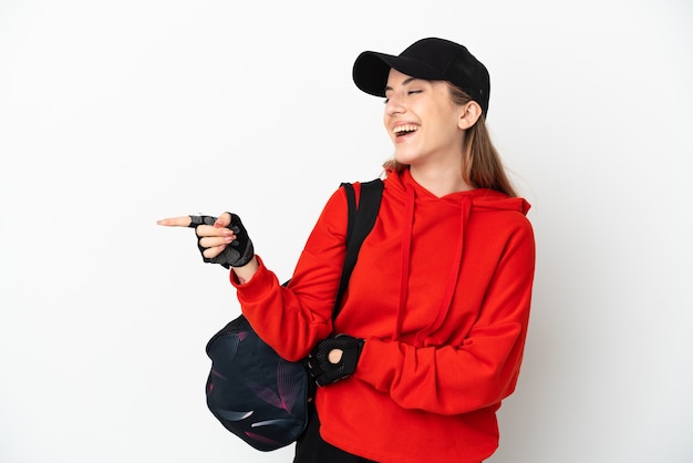 Young sport woman with sport bag isolated