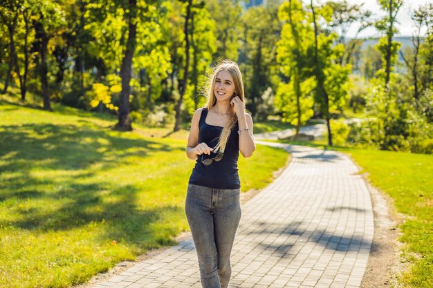 Young sports girl posing in the park