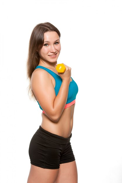 Young sporty girl doing exercise.