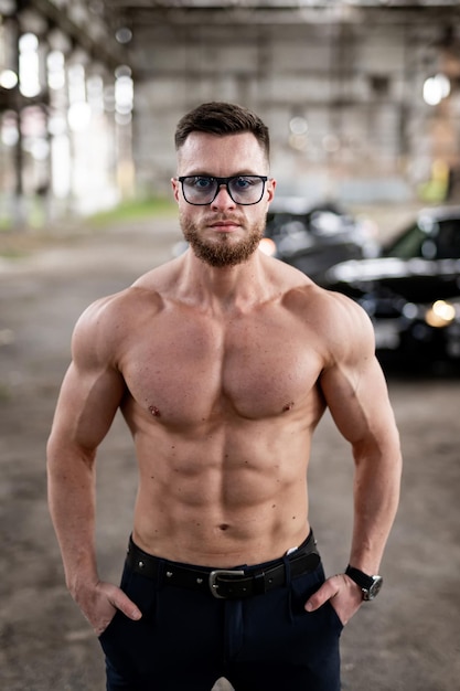 Photo young sporty muscular man with shirtless body handsome athletic lifestyle sexy guy