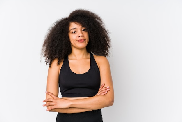 Young sporty woman unhappy with sarcastic expression