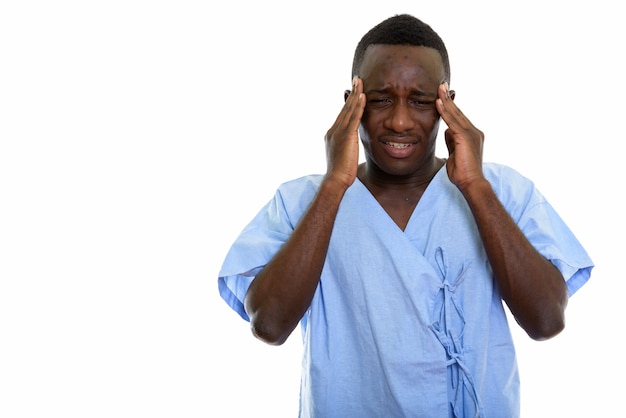 young stressed black African man patient having headache