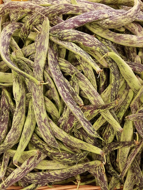 Young string beans on the supermarket shelf