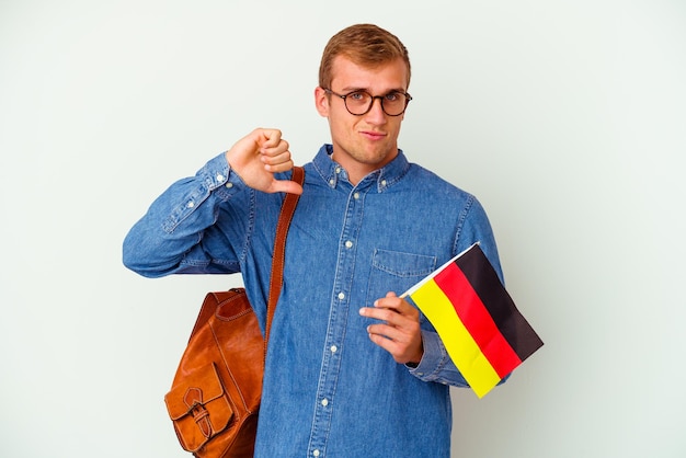 Young student caucasian man studying german isolated on white\
background