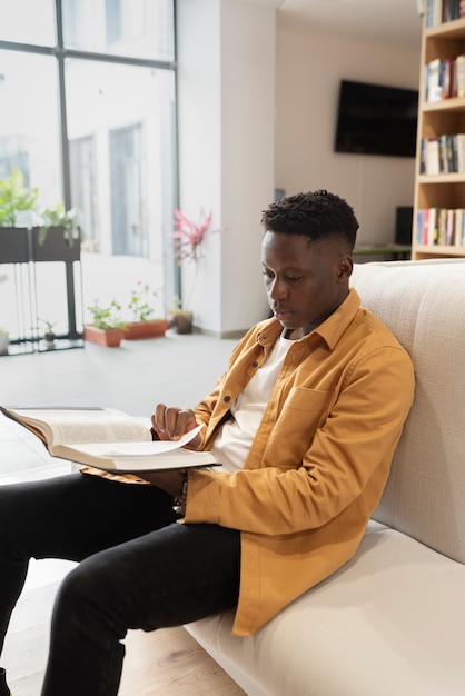 Young student learning in the library