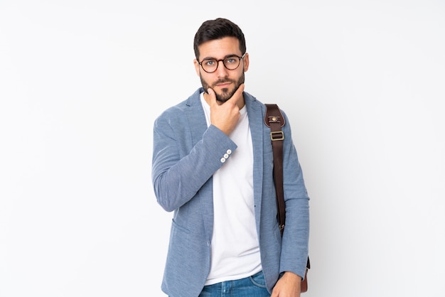 Young student man over isolated wall