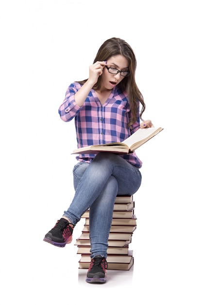 Young student preparing to the college exams isolated on white