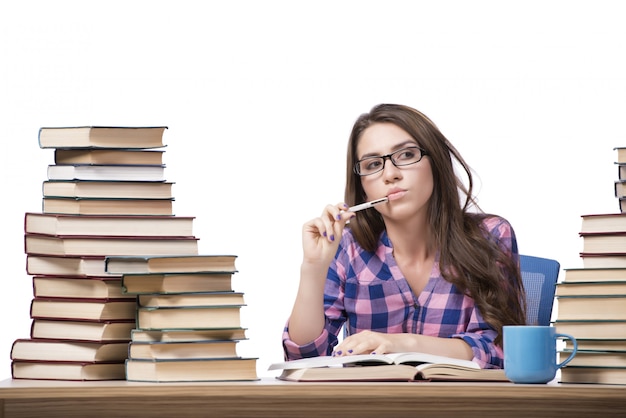 Young student preparing to the college exams isolated on white