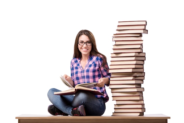 Young student preparing to the college exams isolated on white