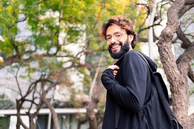 Young student smiling happy in the campus