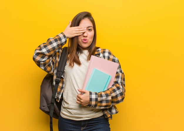 Young student woman feels worried and scared