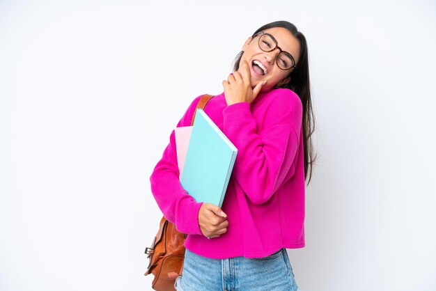 Young student woman isolated on white background happy and smiling