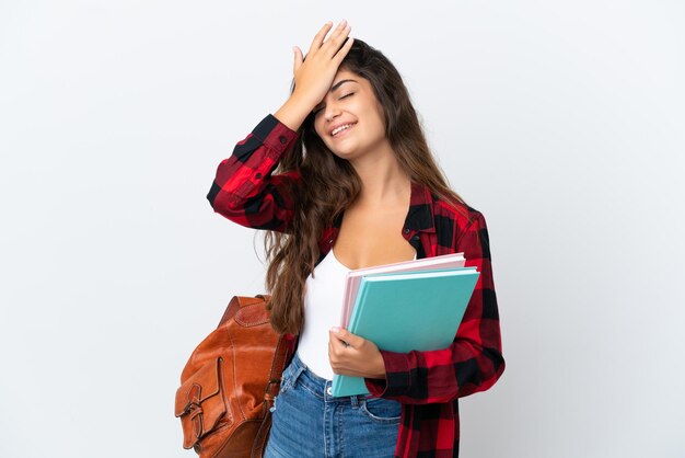 Young student woman isolated on white background has realized something and intending the solution