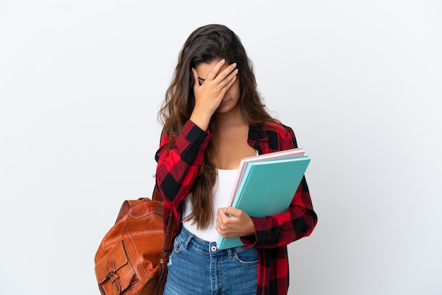 Foto donna giovane studente isolata su sfondo bianco con espressione stanca e malata