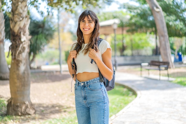 Young student woman at outdoors