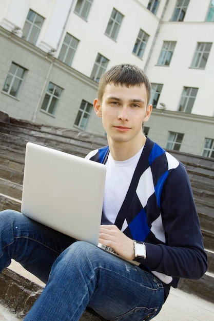 Young student working on a laptop